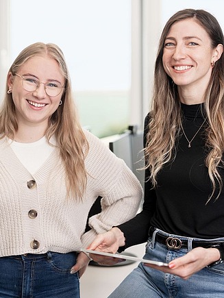 Picture of two women at a desk