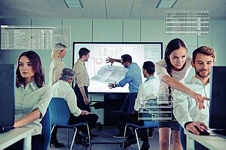 Picture of 8 people in a room working interactively on screens