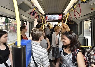 Picture of a fully occupied bus 